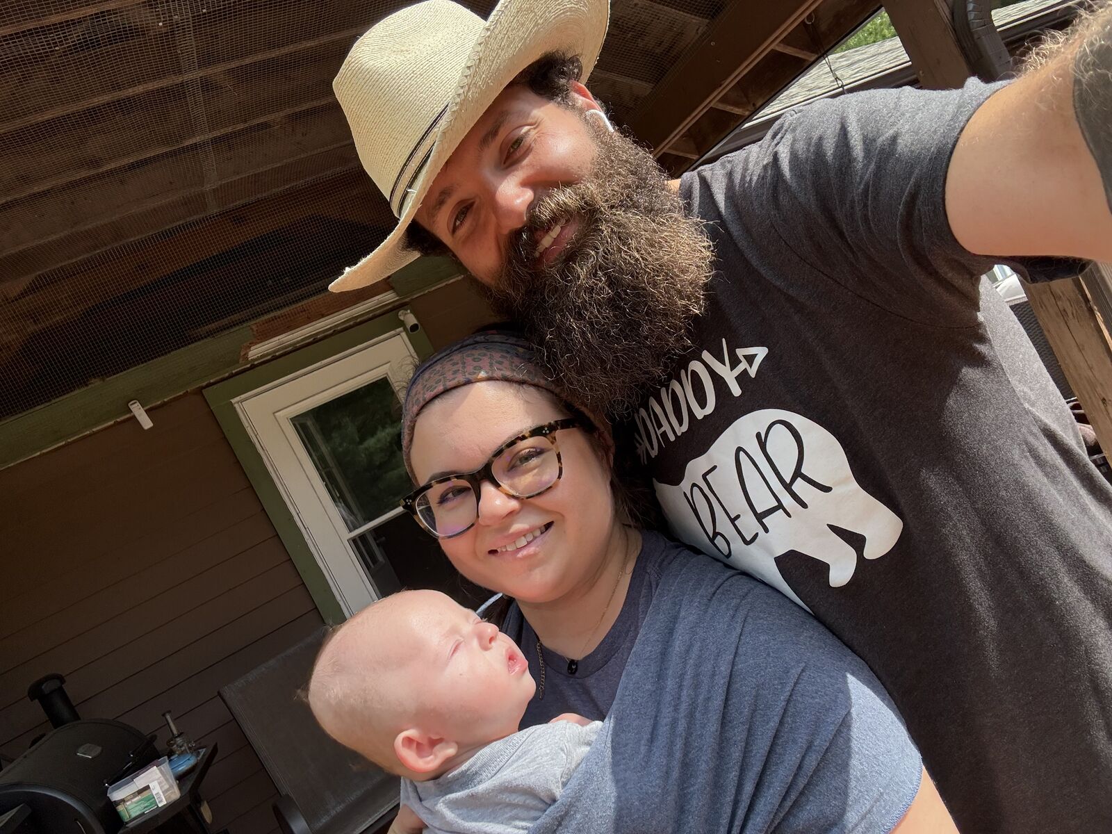 Zach Beaudoin with his wife and son outdoors in the Southtowns